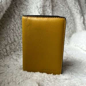 Coach mustard color small wallet/card case. New with tag